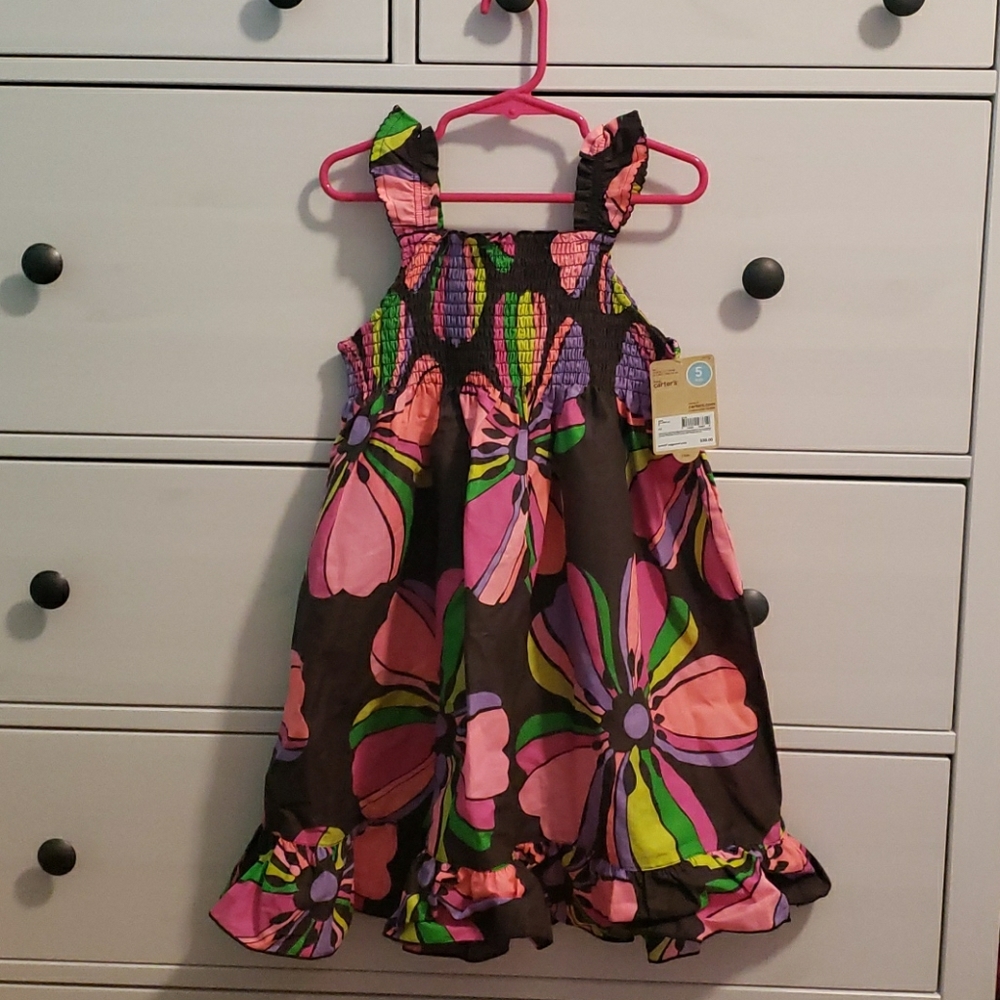Girls flower dress by Carter’s is NWT. Size 5